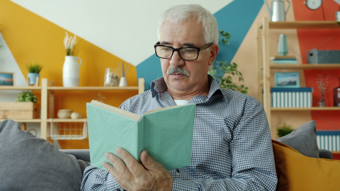 senior reading book