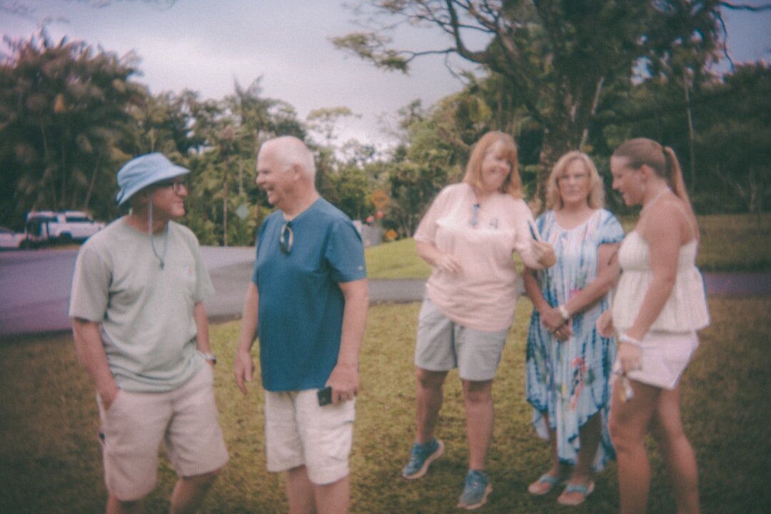 Group of active senior friends laughing together outdoors