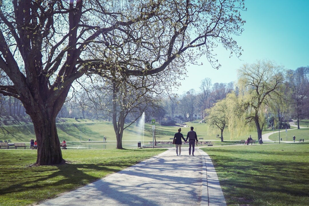 senior couple walking in park