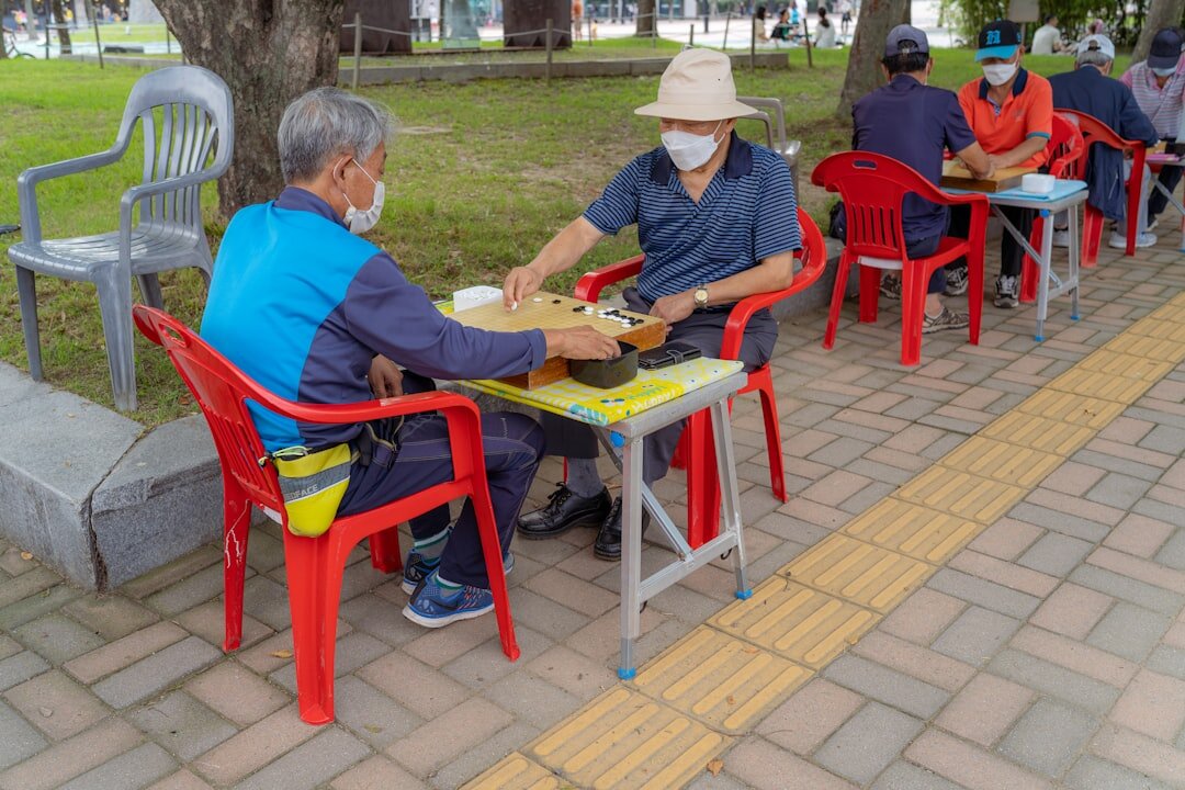 elderly people chatting in club