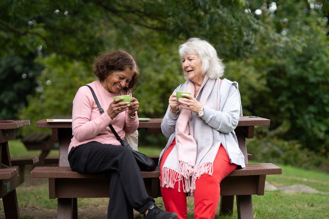 elderly group smiling outdoors