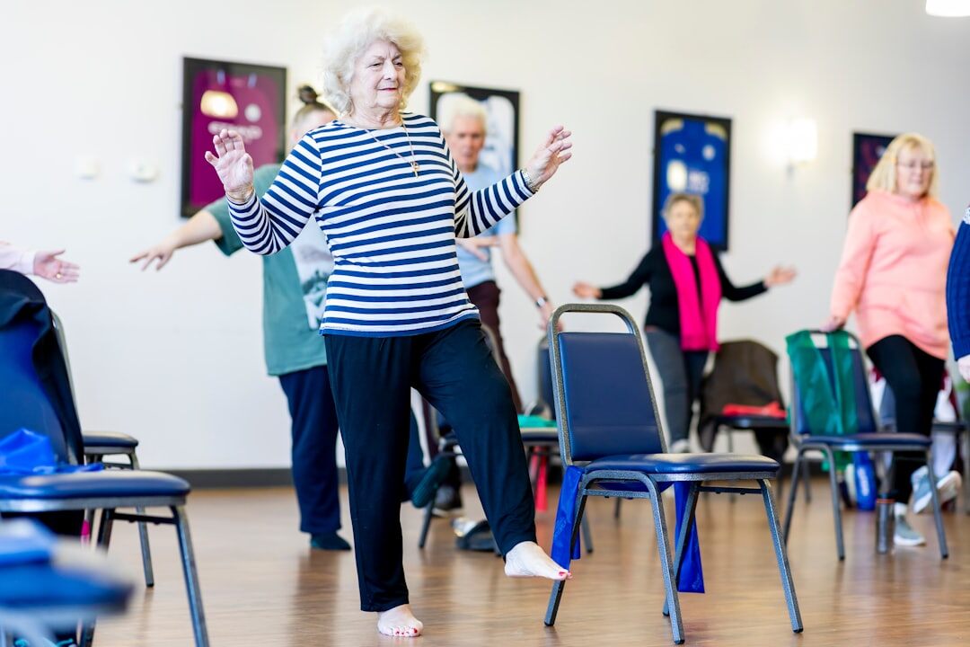 group of seniors doing gentle exercise