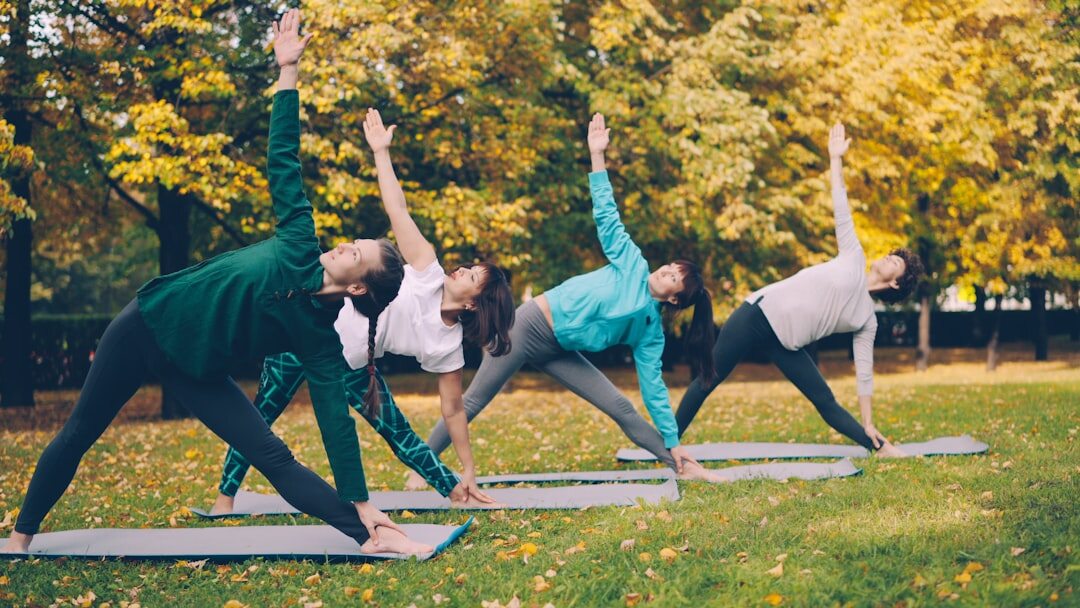 seniors doing yoga outdoors